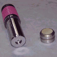 �������M���~���^